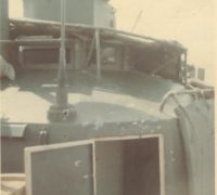 Looking into the Cockswain's flat on Alpha HQ5173. With the door open you can see the inner and outer bulkheads. The theory was that the outer bulkhead was supposed to detonate any incoming rounds and the inner bulkhead stopped the shrapnel. Notice the bullet holes at the base of the antenna.